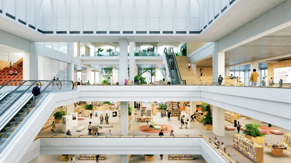 Visualisierung des lichtdurchfluteten Atriums der Zentral- und Landesbibliothek Berlin (ZLB) im Projekt „The Berlinian" – mehrgeschossige Bibliothekshalle mit Gewölbedach, Rolltreppen und offenen Lesebereichen – ein hausInvest-Objekt.