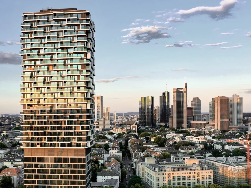 Moderne Hochhäuser in einer Stadtlandschaft bei Sonnenuntergang, links ein markantes Gebäude.